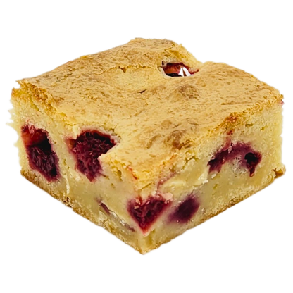 Ambachtelijke Raspberry & White Chocolate Blondie met smeuïge textuur en fruitige frambozen. Bestel in Dendermonde of laat verzenden!